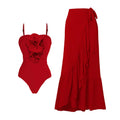 Red women's one-piece V-neck halter swimsuit with a separate long detachable skirt on a mannequin
