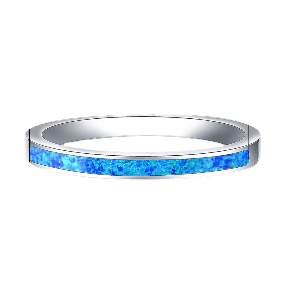 Copper ring with round blue opal stone, geometric simple design