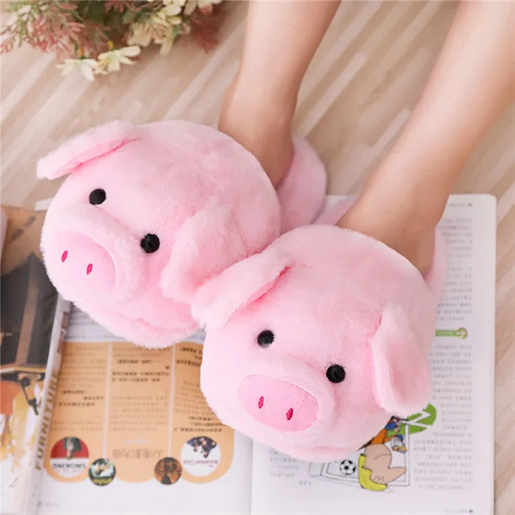 Pink pig-shaped floor slippers made from short plush fabric.