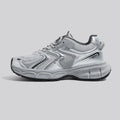 Men's grey low-top platform sneakers with leather stitching on a PU mesh upper and a flat EVA sole.