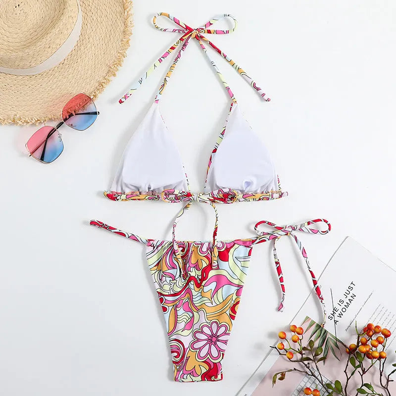 Women's triangle printed bikini with separate top and bottom system featuring hanging neck design