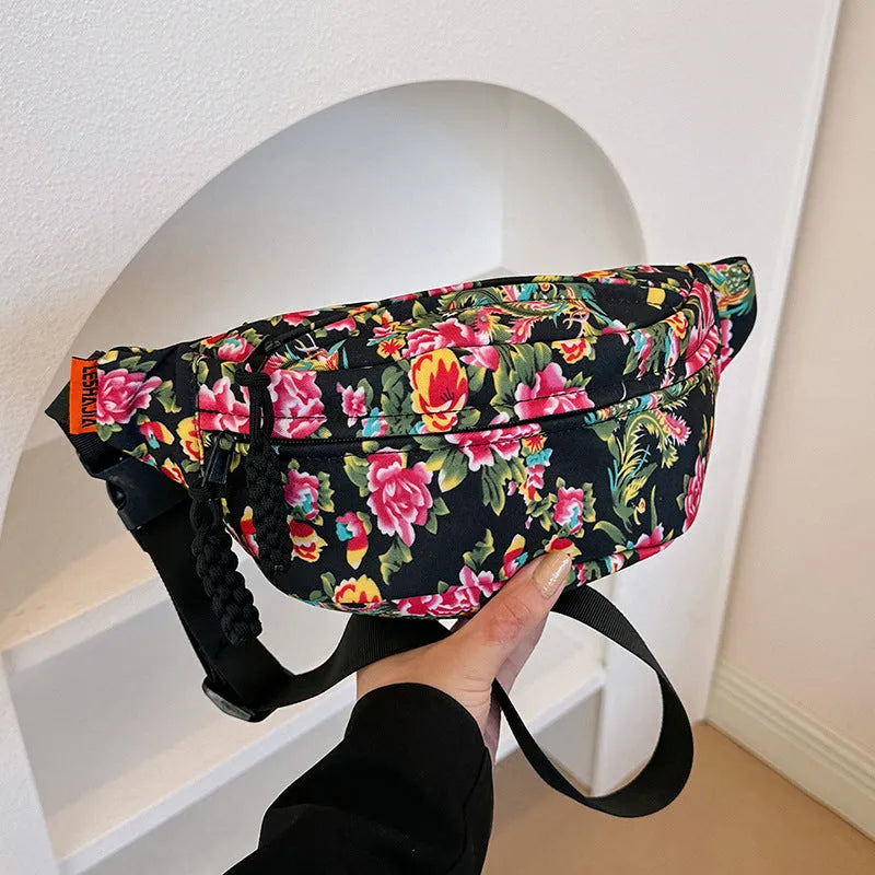 Women's western style waist bag with big flower decoration in black, red, green or blue colours