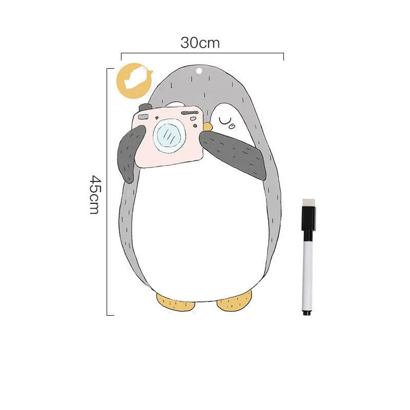 Penguin design refrigerator message board with magnetic backing measuring 45cm by 30cm
