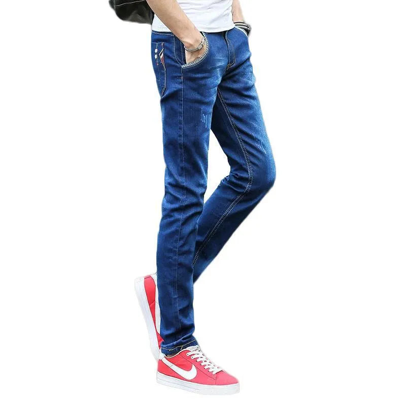 Men's slim fit skinny tapered pants with mid waist and zip fly, shown in blue, grey and black colour options