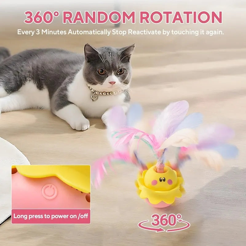Pink interactive automatic cat feather toy with 360° rotation, LED light, and detachable feathers.