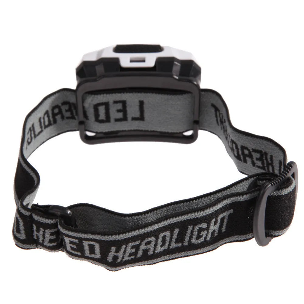 Cat eye 2nd generation outdoor headlight in black with white and red LEDs, shown as a head-mounted light.