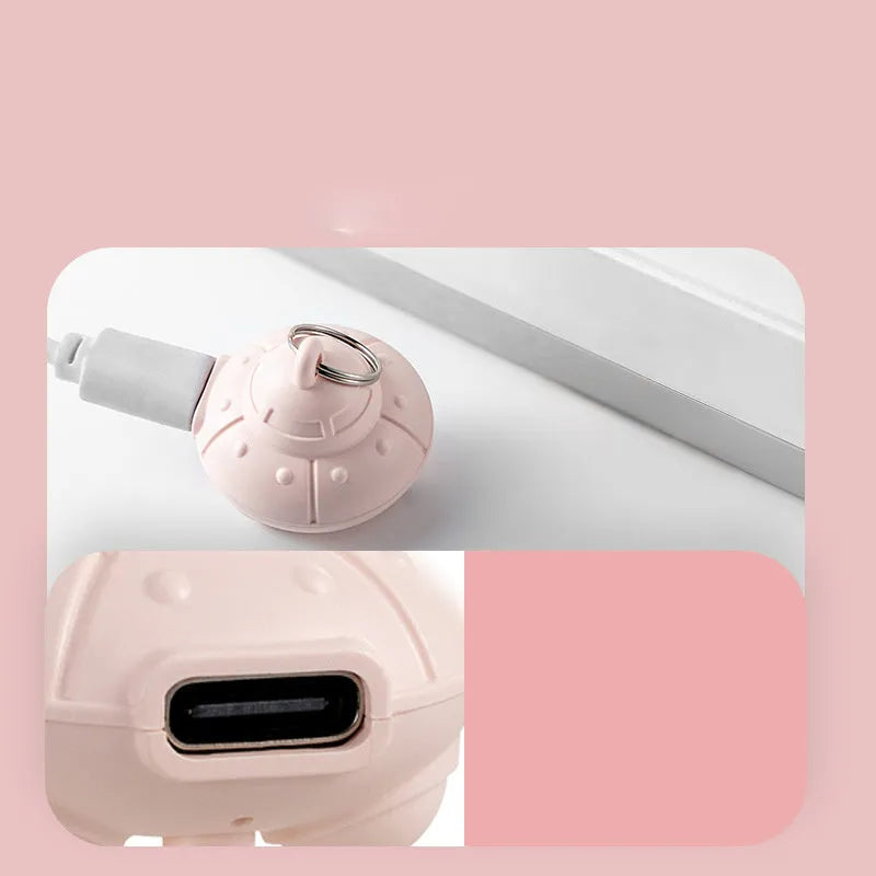 Green cat collar laser toy with USB charging and 360° rotation on a pink cat collar