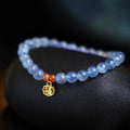 Women's natural crystal bracelet with 8mm ice translucent round beads and sequin accents