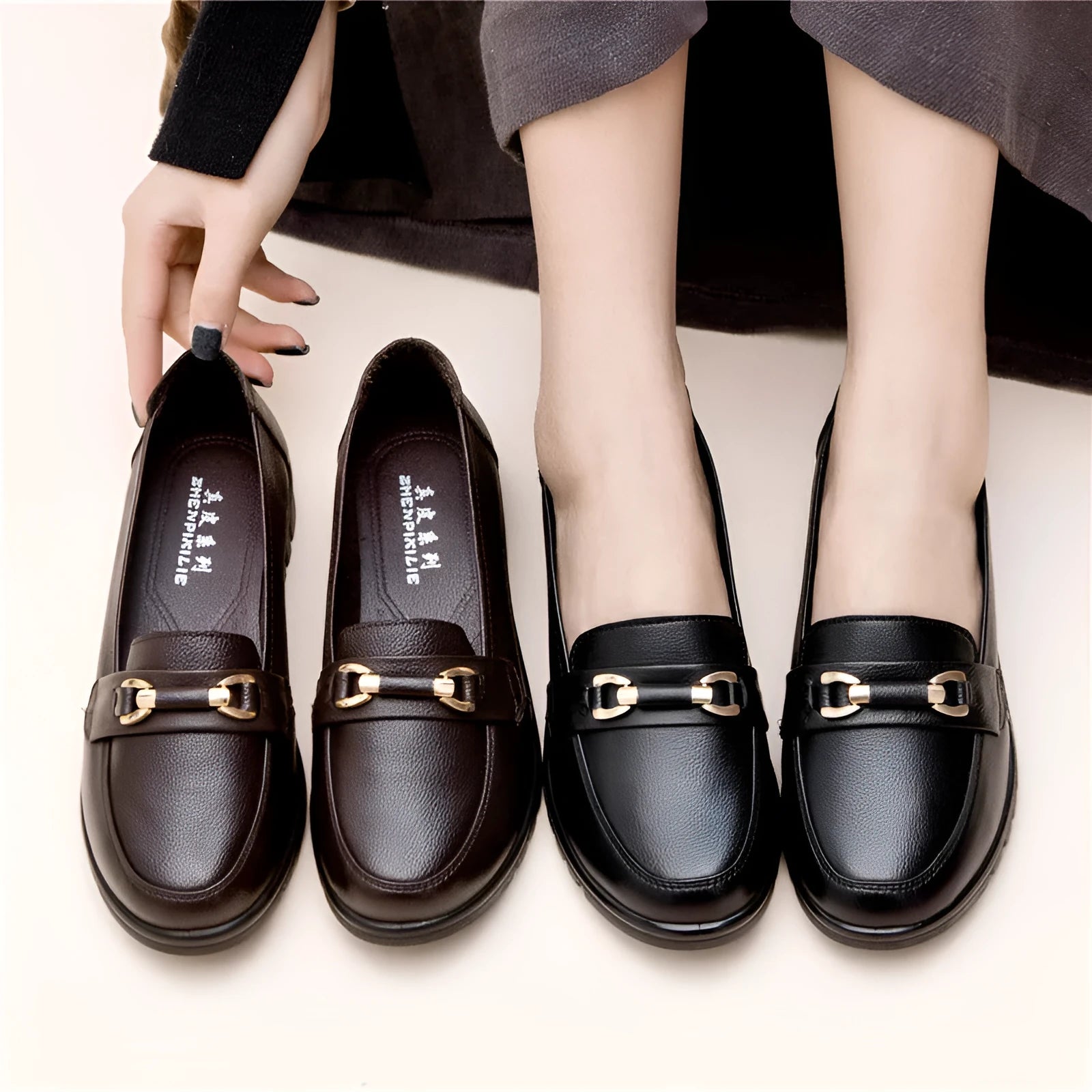 Black women's casual slip-on pumps with round toe, soft sole, and a low flat heel.