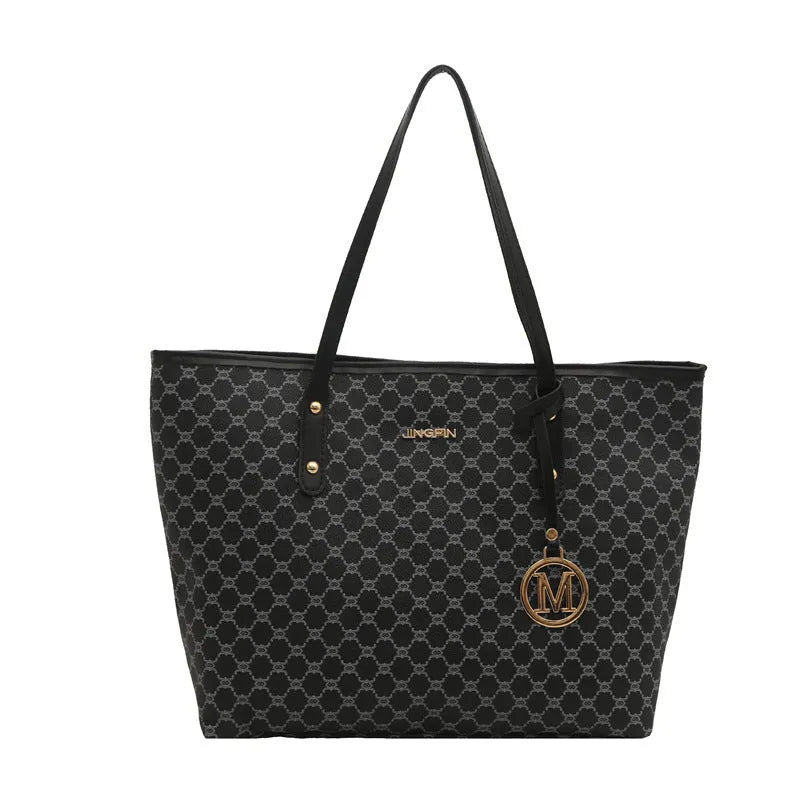 Street style PU shoulder bag with adjustable strap in black colour showing sewing thread detail