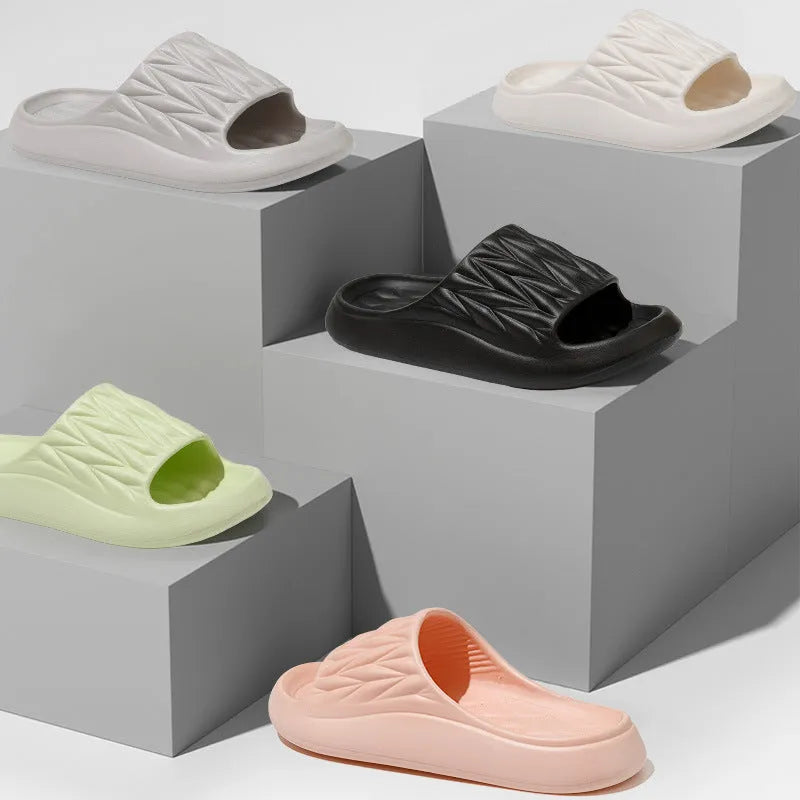 Leaf texture design EVA slippers for indoor summer wear, shown in assorted colours.