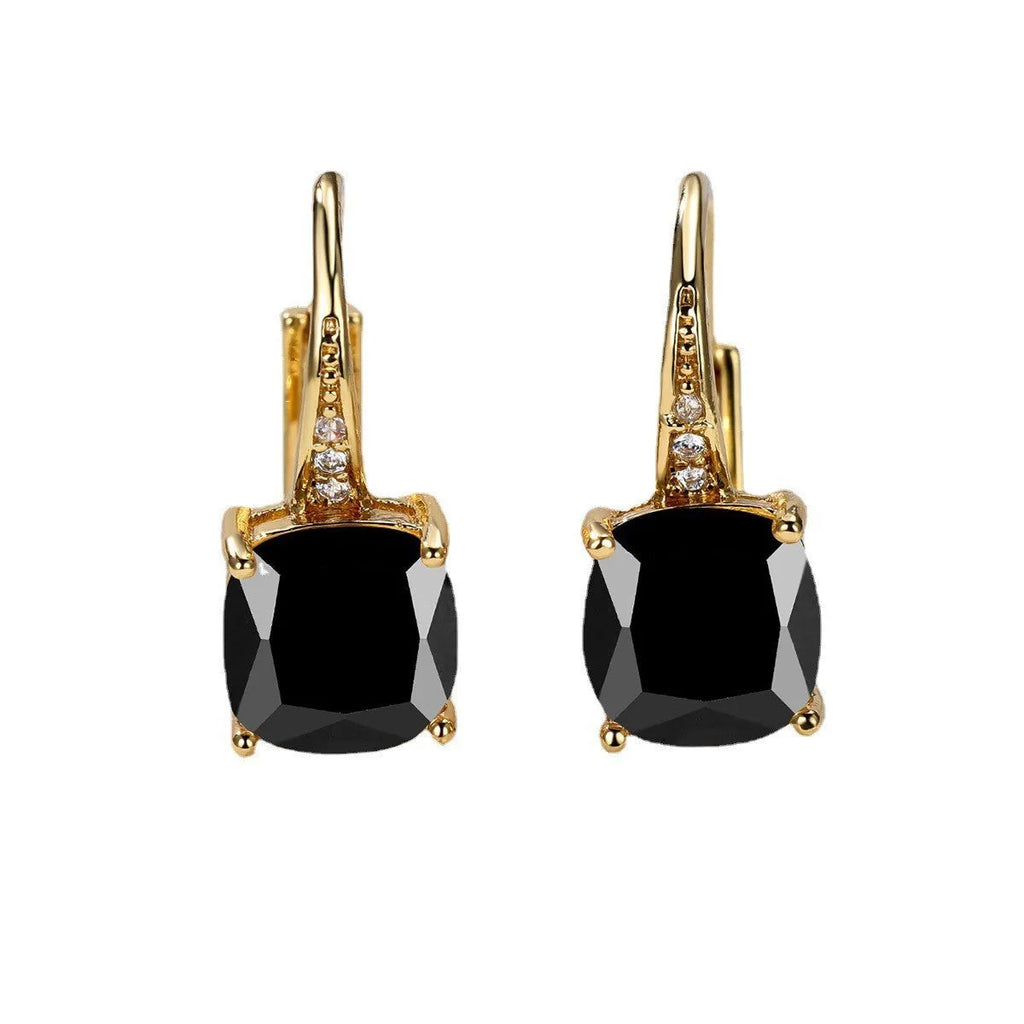 Geometric copper ear hook earrings with a round square zircon inlay, shown in a gold electroplated finish.