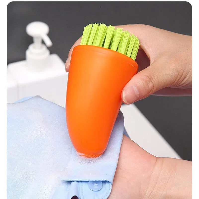 Carrot-shaped nylon cleaning brush in orange colour with radish pattern design