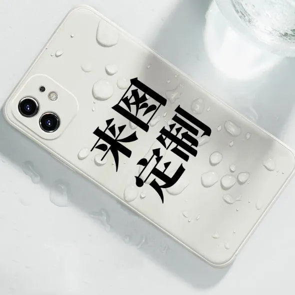 Clear acrylic couple phone cases with black silicone bumpers for iPhone, shown as a pair.