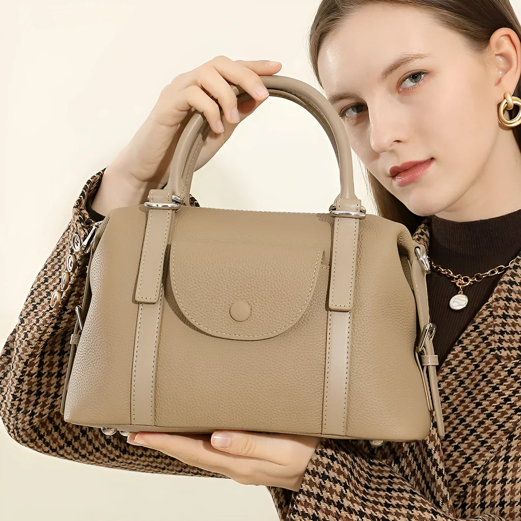 Genuine leather women's handbag in black, brown, or elephant grey with contrast stitching.