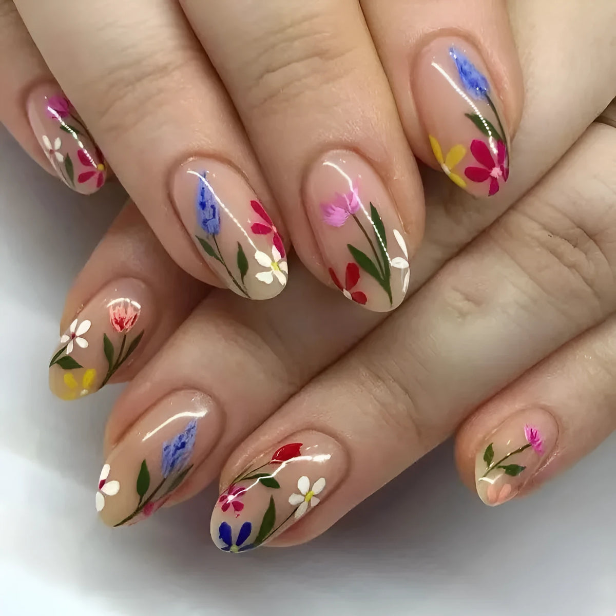 Almond-shaped removable nail wraps with European floral armour rose and tulip patterns