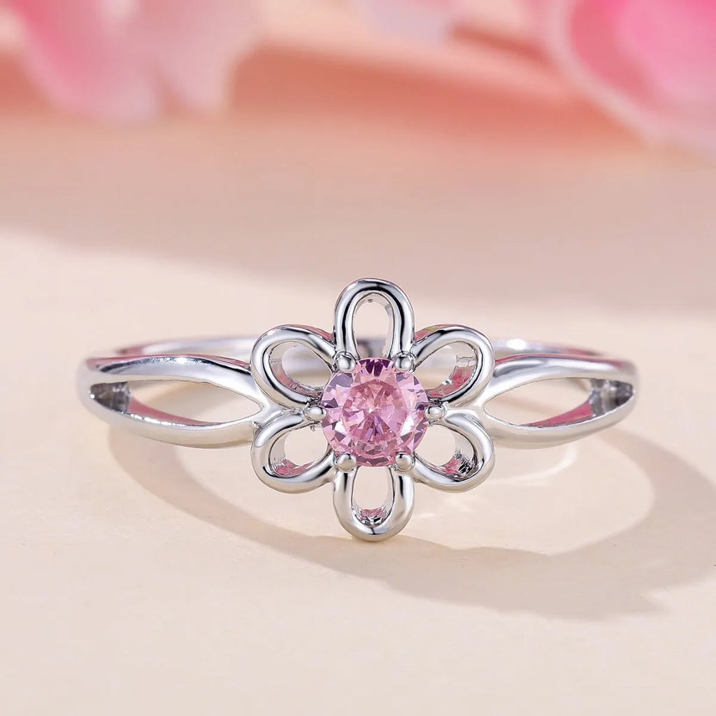 Women's electroplated copper ring with floral hollowed design in platinum pink diamond colour