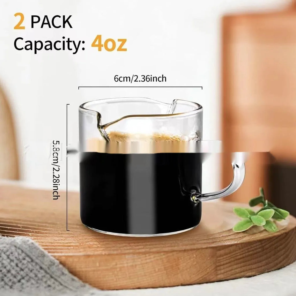 White double mouth transparent glass coffee cups showing two pouring spouts