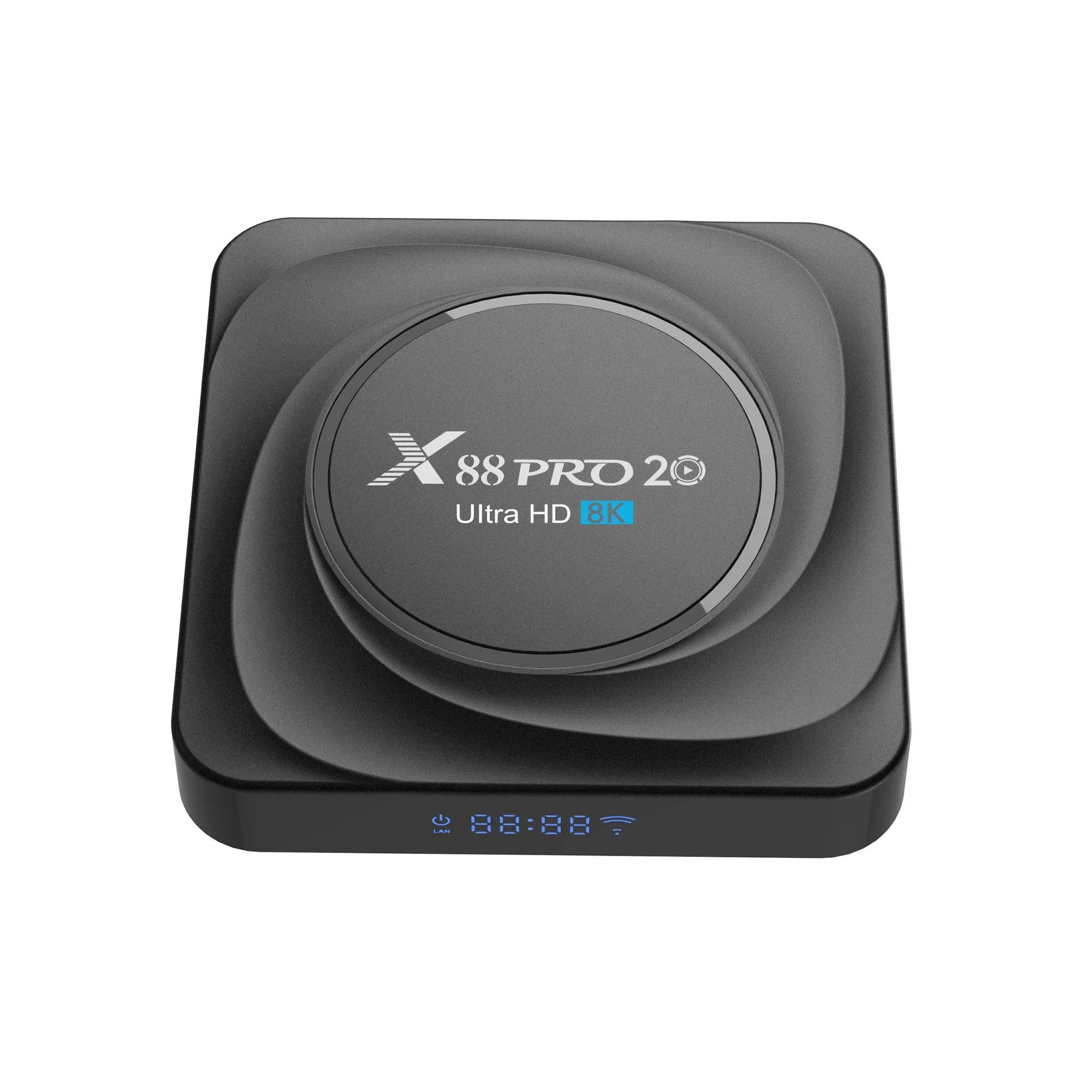 Compact black Android TV box with HDMI port, shown with remote control and power cable