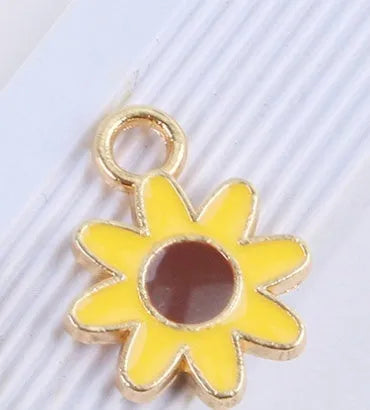 Cute flower keychain accessory in alloy with dripping oil finish, available in P777-1 P777-2 P777-3 colours