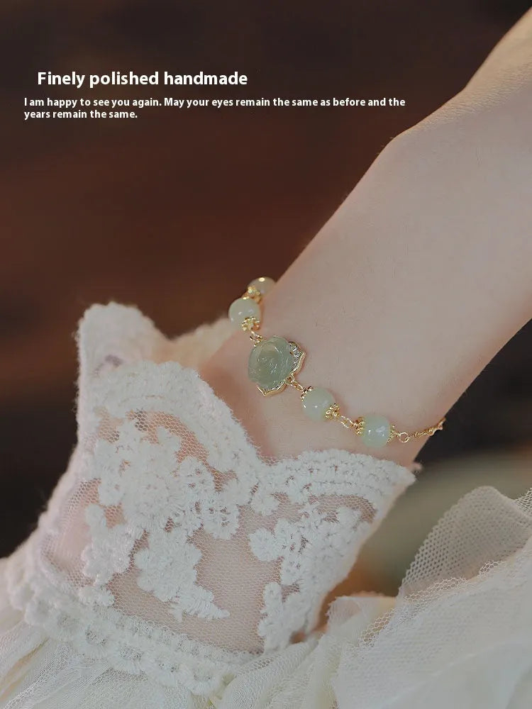 Handmade Hetian Jade women's bracelet with 14K gold gilding and floral rose design