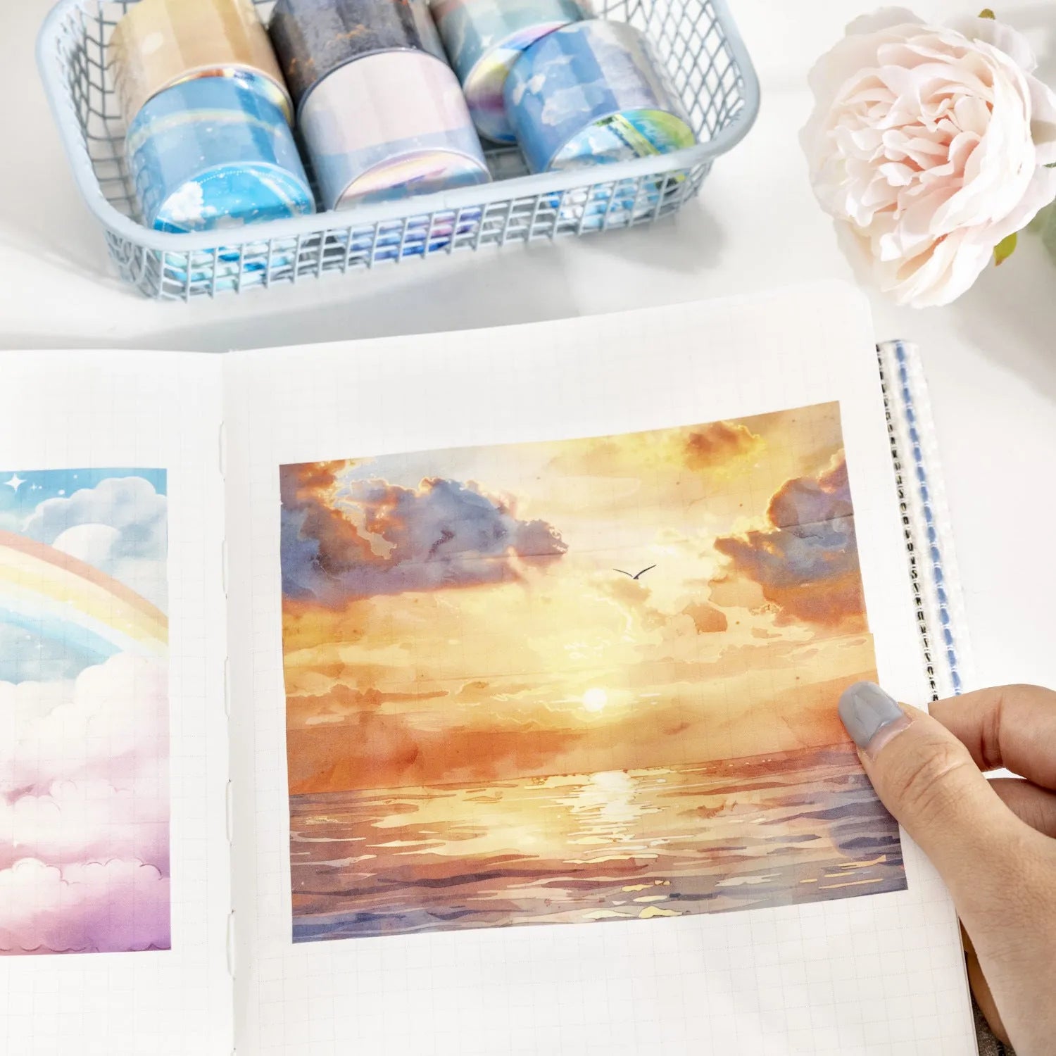 Roll of Japanese paper washi tape with colourful sky cloud patterns, showing 30mm width