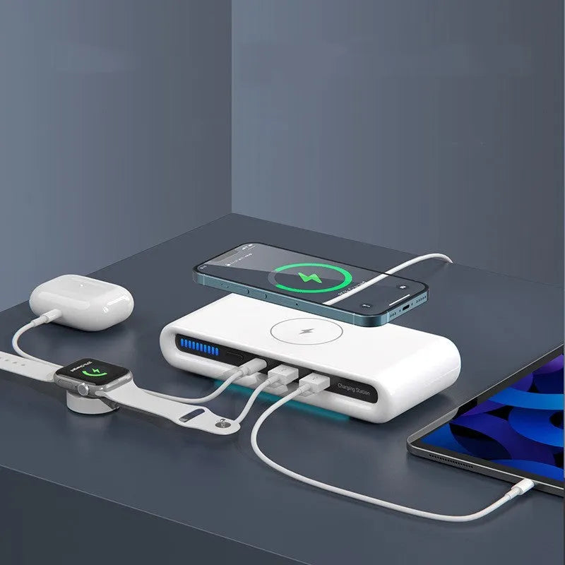 White desktop wireless charging pad with illuminated multi-colour ambient lamp ring.