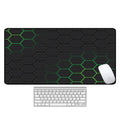 Large rectangular desk pad with printed pattern and natural rubber non-slip base for office or gaming desks.