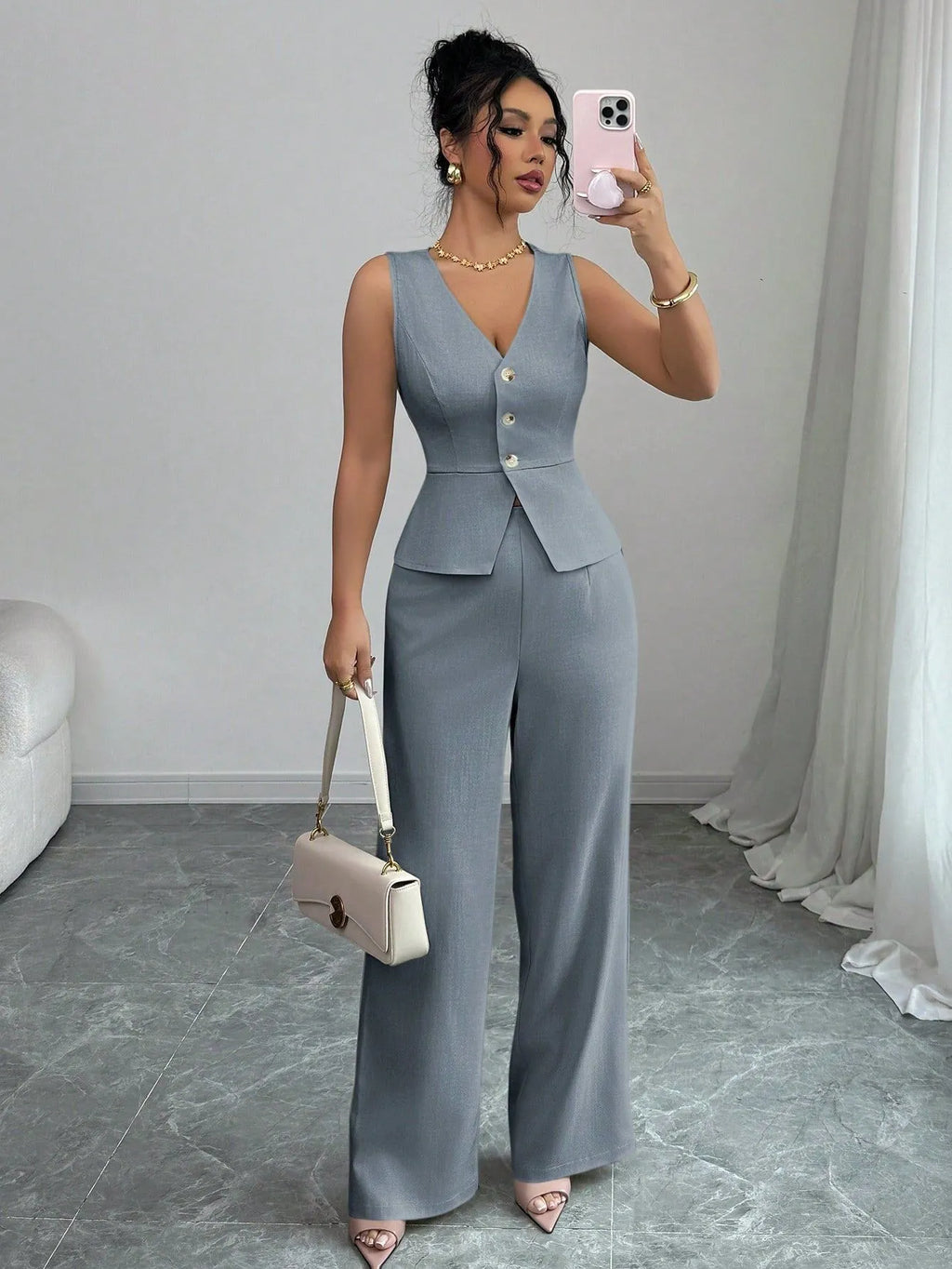 Women's solid colour sleeveless vest and high-waist trousers two-piece set in a casual style.