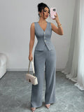 Women's solid colour sleeveless vest and high-waist trousers two-piece set in a casual style.