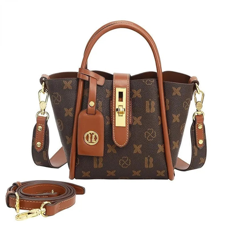 Women's portable PVC bucket messenger bag in coffee brown colour with soft handle and lined interior