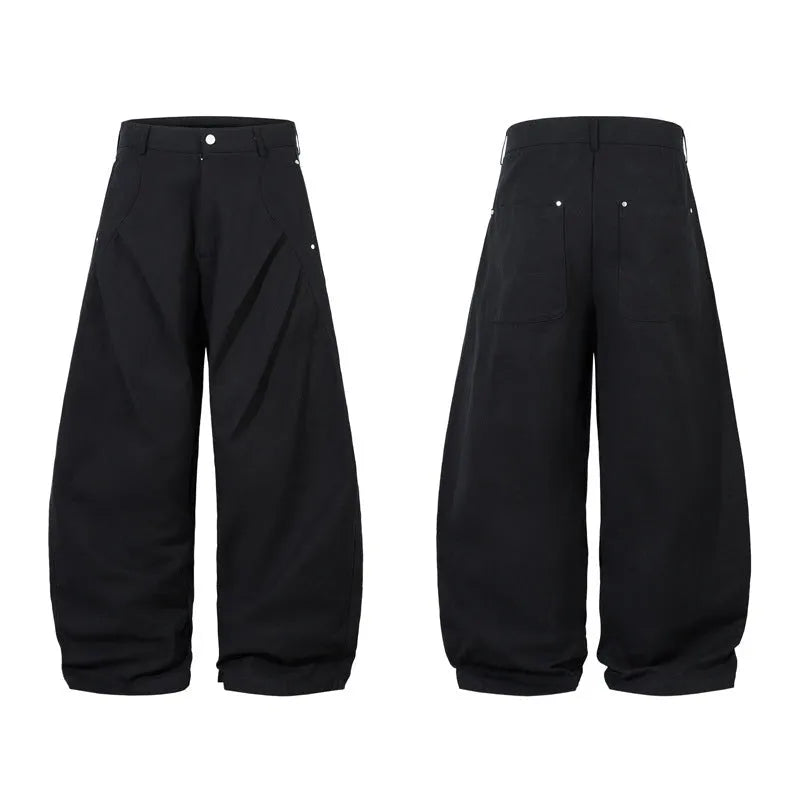 Men's black cotton pleated machete trousers with wide legs and elastic mid waist