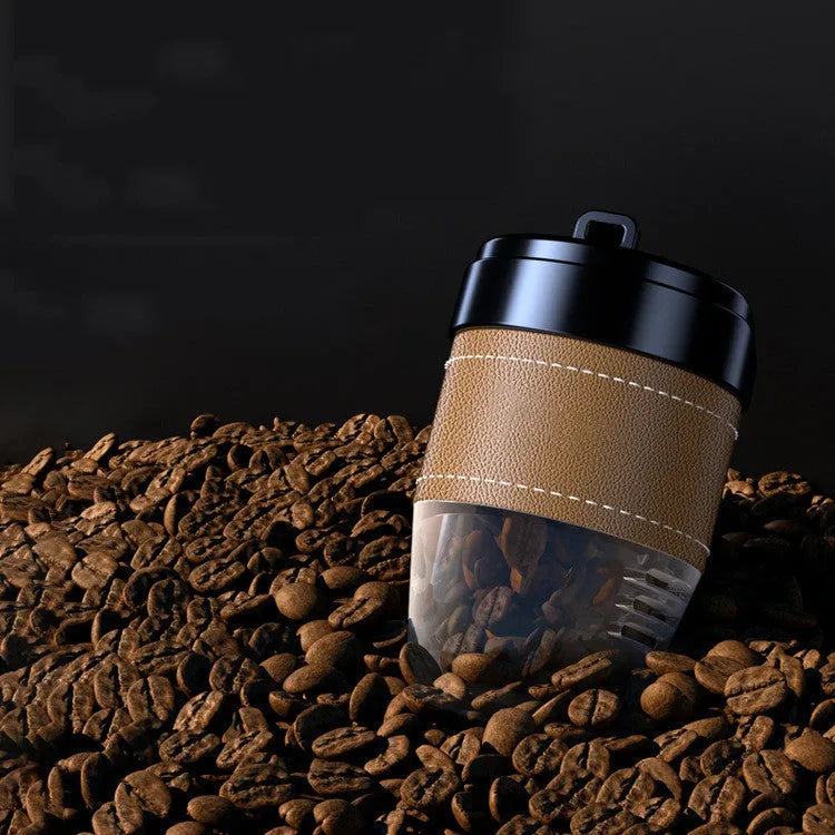 Coffee cup shaped car air freshener in various colours providing fragrance and odour removal.