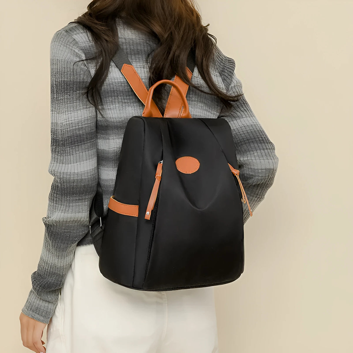 Waterproof Oxford cloth anti-theft travel backpack in black with sandwich pocket and zipper compartments