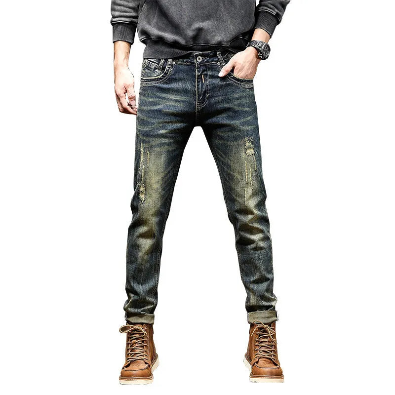 Man wearing retro coloured stretch cotton denim skinny fit jeans with a zip fly.