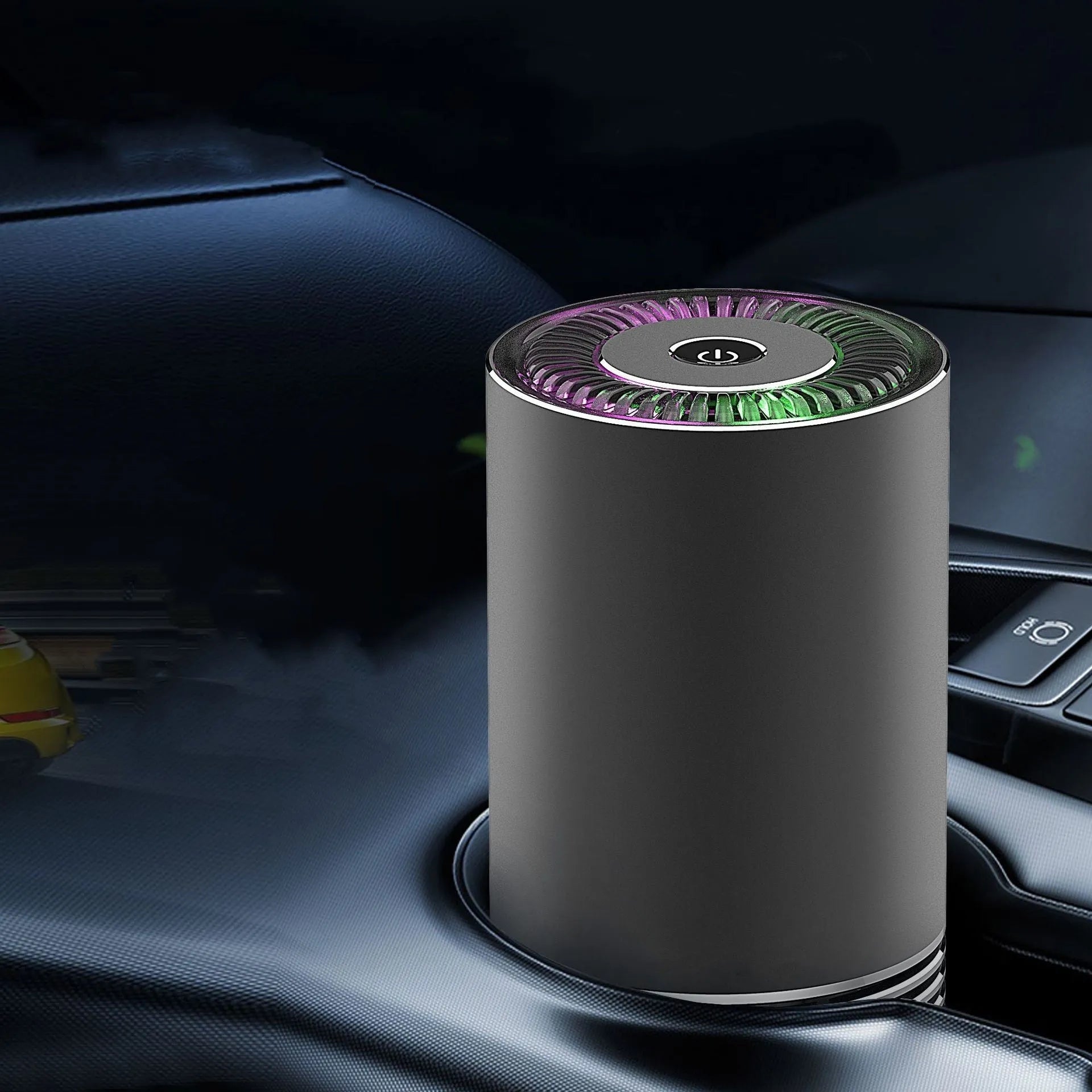 Black aluminium alloy car air purifier with USB cable on a car dashboard