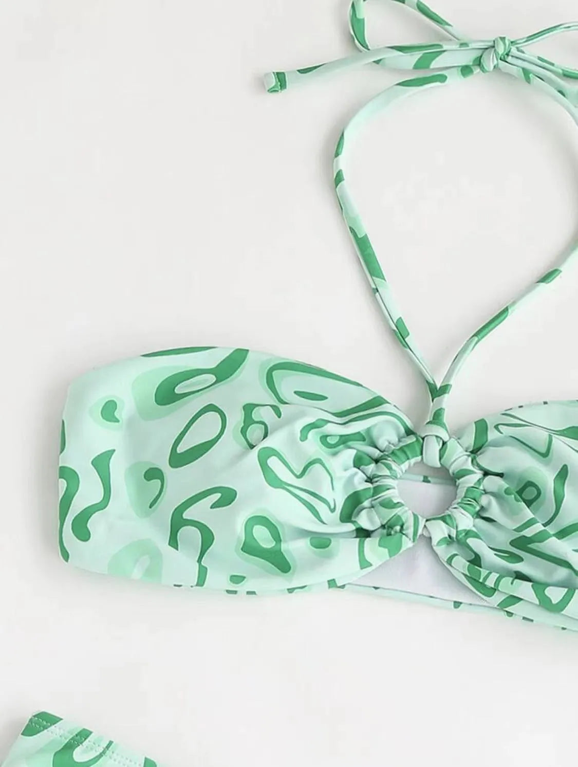 Green floral bandeau bikini swimsuit with backless design and split-style briefs