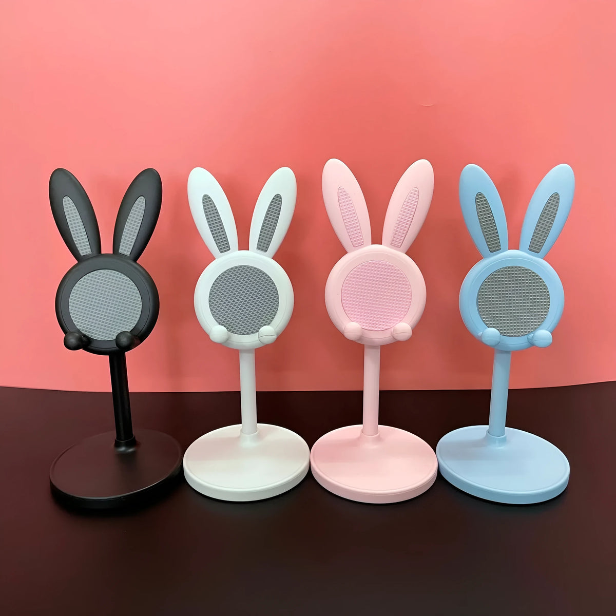 Cartoon bunny desktop phone tablet adjustable bracket in plastic, white colour, tilted view