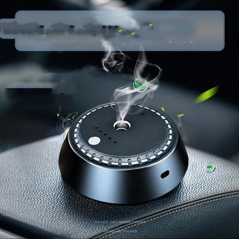 Black metal car aroma diffuser measuring 9x4.5cm with ultrasonic atomizer technology