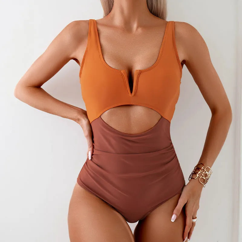 Women's one-piece swimsuit with colour-block design in nylon fabric.