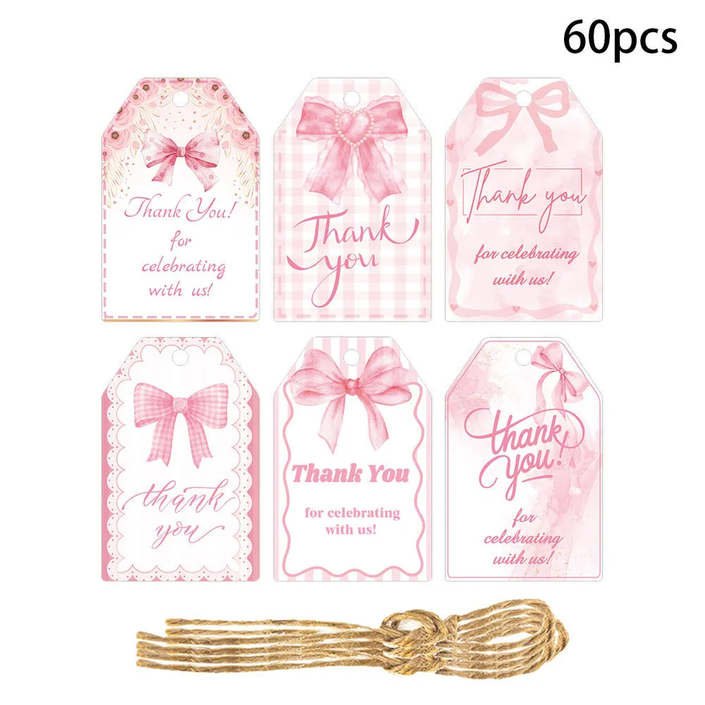 Set of 60 paper birthday gift tags with bowknot designs and natural hemp rope in three decorative styles
