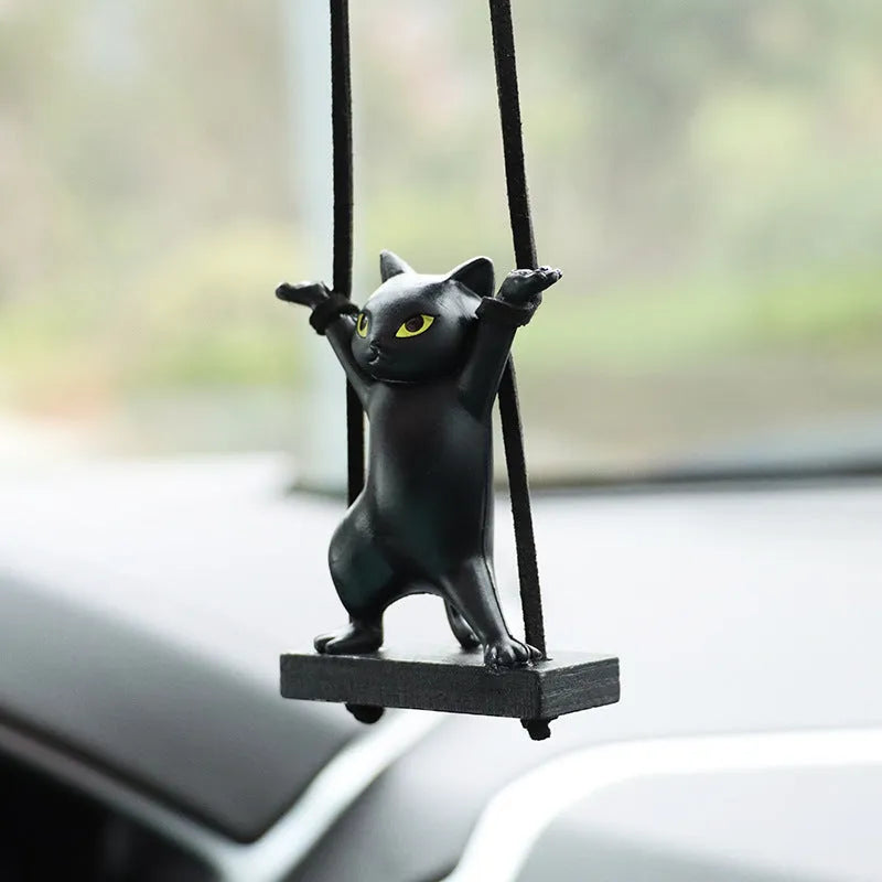 Resin cartoon cat pendant for car interior decoration with adjustable rope, shown in multiple colour options.