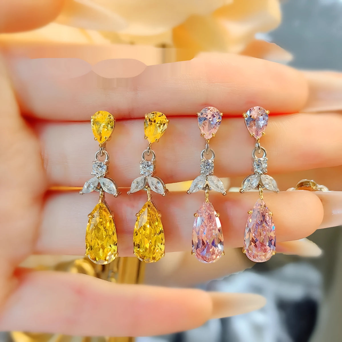 Pair of floral earrings in pink or yellow diamond finish with copper base and retro petal design