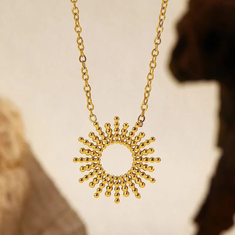 Gold-tone geometric chain necklace and bracelet set with sunflower design on stainless steel