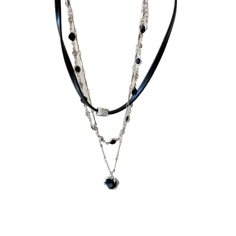 Women's leather heart necklace set showing double-layer and single-layer pendant designs on adjustable clavicle chain