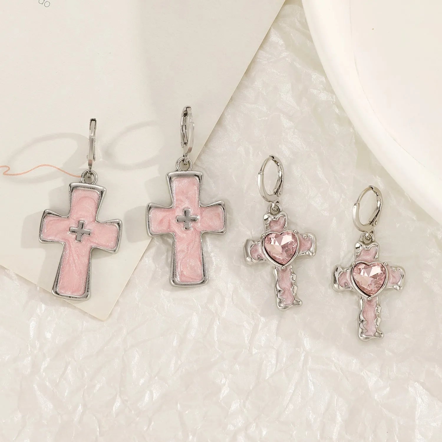 Women's alloy earrings with cross crystal designs in white, black cat, and antique silver colour options