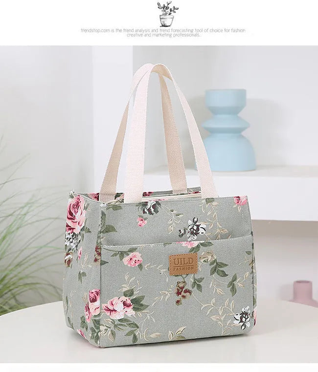 Women's printed canvas tote bag with aluminium frame in a square shape, showing floral and typographic design options.