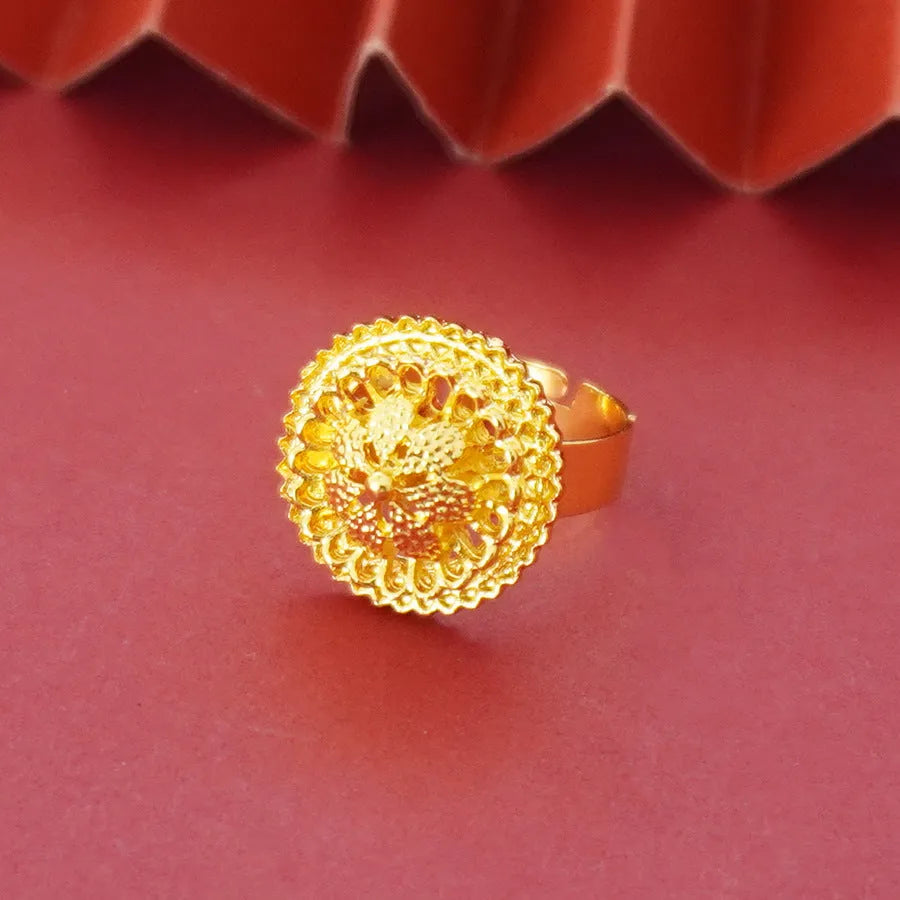 Gold-plated three-piece jewellery set with flower design, including necklace, earrings and ring