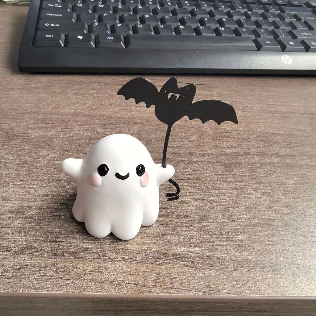 Mini ghost holding bat walking dog resin statue Halloween decoration measuring 4x5x4cm