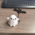 Mini ghost holding bat walking dog resin statue Halloween decoration measuring 4x5x4cm